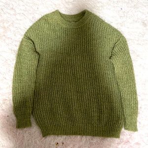 green sweater